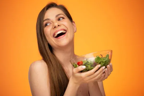 Nobody Actually Eats Salad Like That: A Field Guide to Stock Photo Unreality